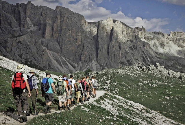 Allein in der Gruppe unterwegs: Reisen mit Fremden liegen im Trend.  | Foto: Pollograpghy (photocase.de)