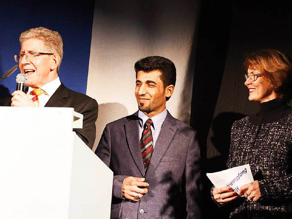 OB Müller mit Mahmoud Al Hossin und Moderatorin Stefanie Kremling Deinert OB Müller mit Mahmoud Al Hossin und Moderatorin Stefanie Kremling Deinert