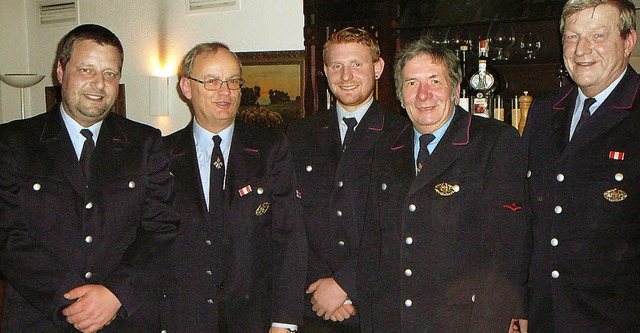 Kommandant Benjamin Wasmer (links) und...nd  Rolf Mller (40 Jahre, von links).  | Foto: Mck