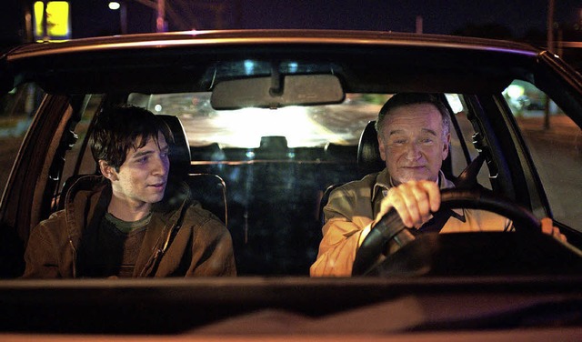 Robin Williams (r.) als Nolan und Roberto Aguire als Leo   | Foto: dpa