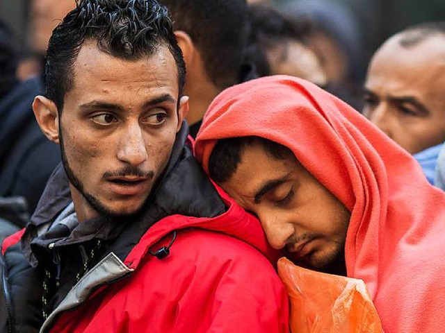 Erschpfte Flchtlinge in Berlin.  | Foto: dpa