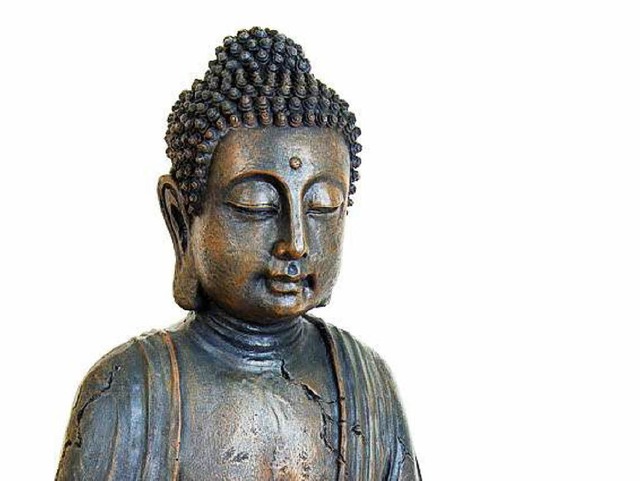 Eine kleine Buddha-Statue sorgt auf ei...rischen Friedhof fr erhitzte Gemter.  | Foto: Sven Weber/fotolia.com