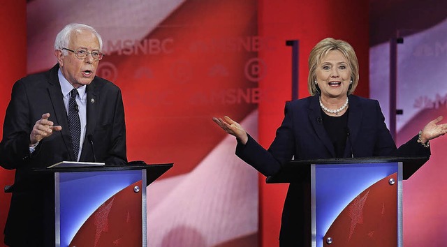 Sanders und Clinton bei der TV-Debatte in New Hampshire   | Foto: AFP