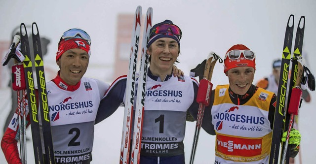 Dreifachfreude: Sieger Jarl Magnus Rii...ito Watabe (links) und  Eric Frenzel    | Foto: AFP