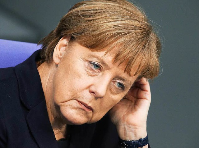 Warb auch am Mittwoch vor dem Bundesta...skrise: Bundeskanzlerin Angela Merkel   | Foto: DPA