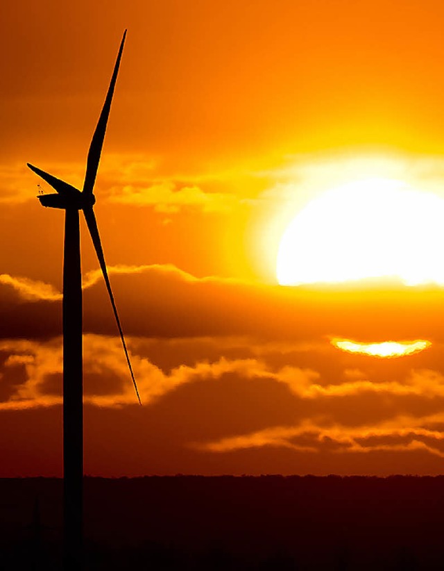 Windrad vor Morgensonne   | Foto: dpa