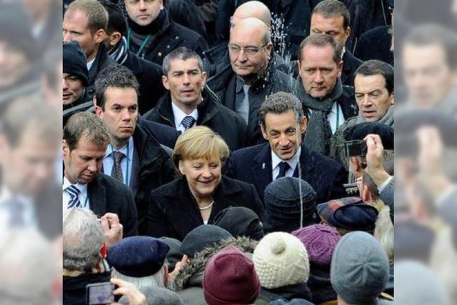 Wasserspritzer-Angriff auf Merkel und Sarkozy