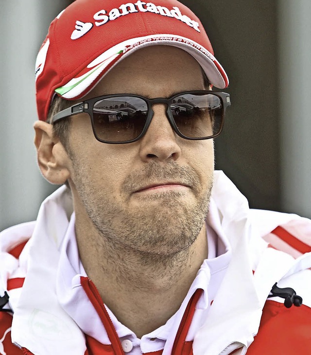 Rasant in Rot: Sebastian Vettel   | Foto: dpa