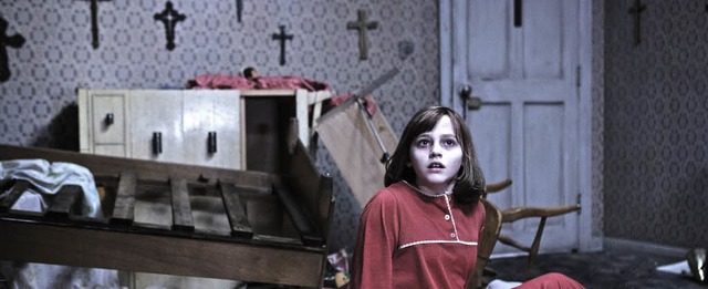 Panik im Horrorhaus: Madison Wolfe als Janet in &#8222;Conjuring 2&#8220;  | Foto: Warner/afp