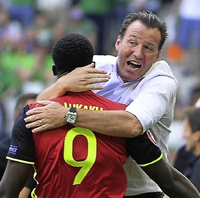 Beste Freunde: Belgiens Coach Marc Wilmots (rechts) und Angreifer Romelu Lukaku   | Foto: afp