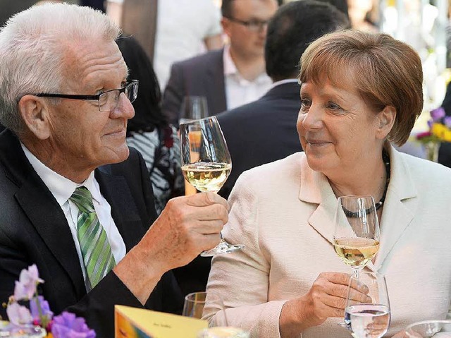 Ministerprsident Winfried Kretschmann und Kanzlerin Angela Merkel   | Foto: DPA