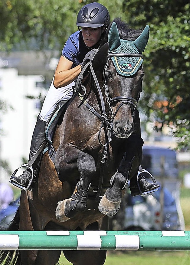 Lieen beim M-Springen alle Hinderniss...Carmen Vogt-Brndlin und Petit Prince   | Foto: Grant Hubbs