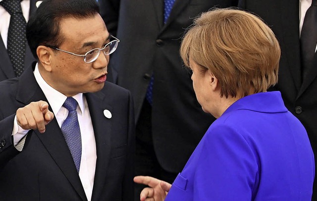 Chinas Regierungschef Li Keqiang und Kanzlerin Angela Merkel im Gesprch   | Foto: DPA