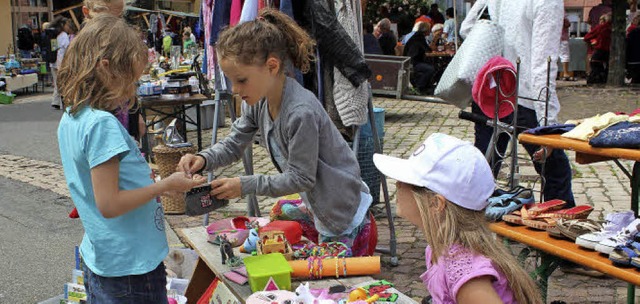 Lass mal schauen, was Du im Geldbeutel... sich ber ein erfolgreiches Geschft.  | Foto: Christa Maier