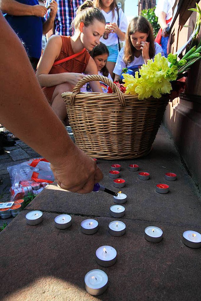 Gedenkminute fr die Opfer des Amoklaufs in Mnchen  | Foto: Patrik Mller