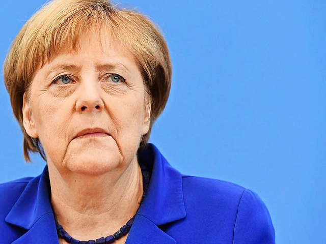 Angela Merkel bei der Pressekonferenz in Berlin.  | Foto: AFP