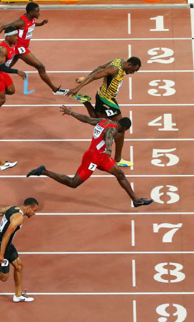 Superspinter Usain Bolt in Gelb, oben ...s der Perspektive der Christus-Statue   | Foto: dpa
