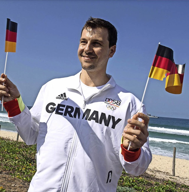 bt schon mal: Fahnentrger Timo Boll   | Foto: dpa