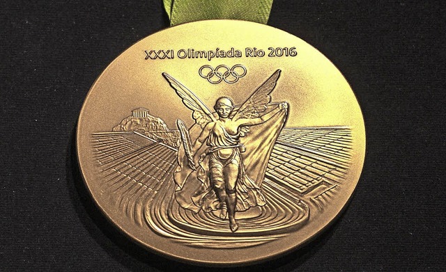 Objekt der Begierde &#8211; die Goldmedaille, samt Kehrseite   | Foto: dpa