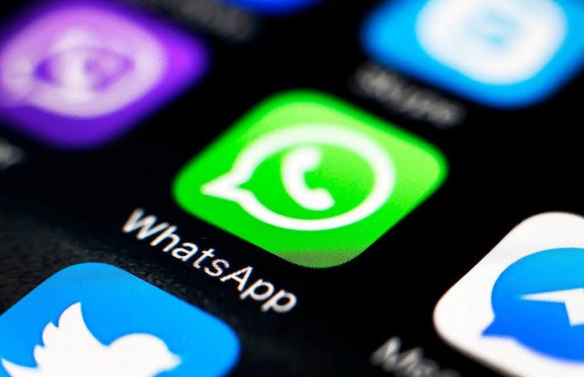 WhatsApp wird knftig einige Daten mit Facebook teilen.  | Foto: dpa