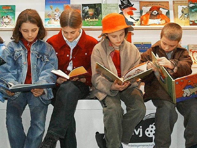 &#8222;Lesen, lesen, lesen&#8220;: Kinder brauchen Bcher.   | Foto: dpa