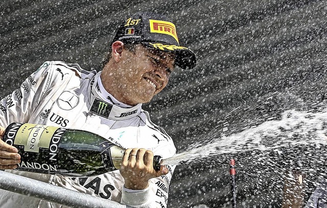 Nico Rosberg feiert seinen Premierensieg beim Grand-Prix von Belgien.   | Foto: dpa