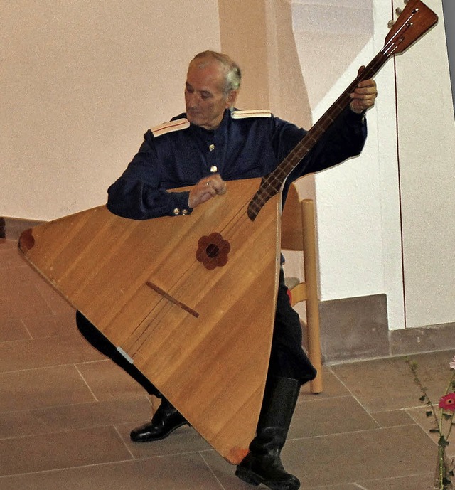 Wolga-Kosake mit Balalaika  | Foto: Rolf Reimann