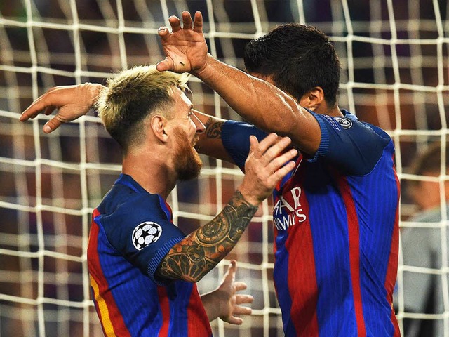 Messi (links) mit Luis Suarez  | Foto: AFP