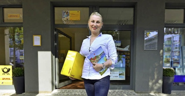 Olga Klik ist neue Betreiberin der Pos...(rechts) befindet sich ihr Reisebro.   | Foto: Ingo Schneider