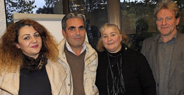 Reinhard Zahn mit den  Stadtteileltern... Taufik Alhamoud und  Lidia Schwaldat   | Foto: Martina David-Wenk