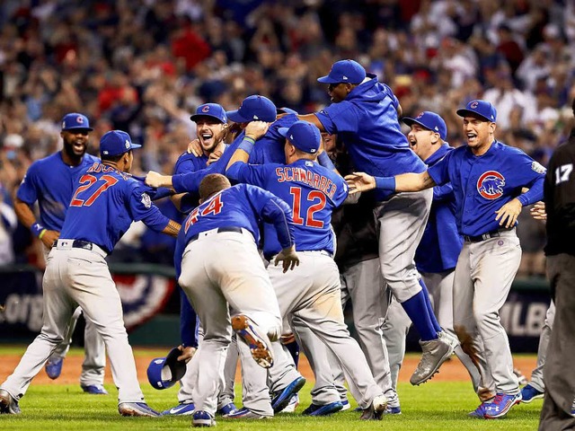 Die Chicago Cubs feiern ihren Titel nach dem Sieg  | Foto: AFP