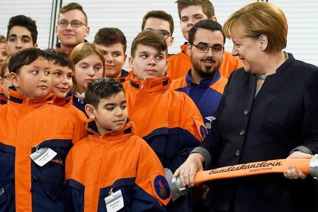 Angela Merkel lobt Migrantenverbände
