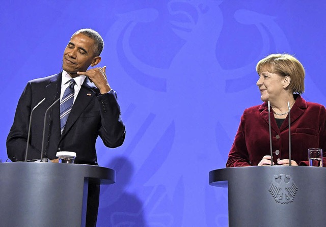 Ruf mich an: US-Prsident Obama und Bu... bei der Pressekonferenz im Kanzleramt  | Foto: dpa