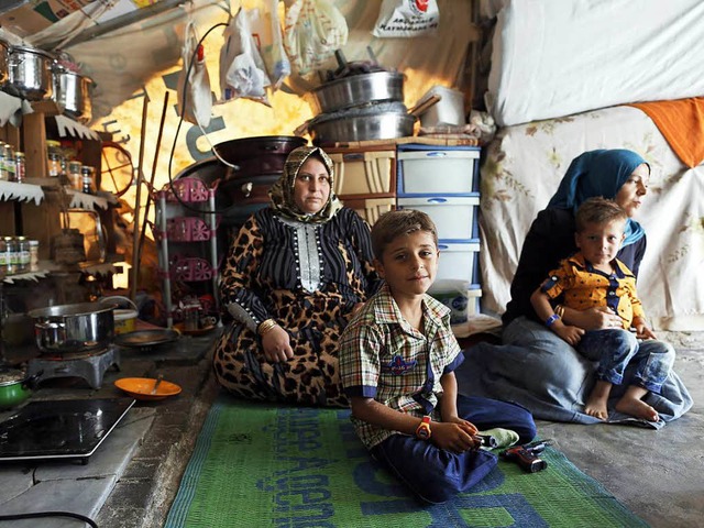 Syrische Flchtlinge in einem Flchtlingslager im trkischen Sanliurfa  | Foto: dpa