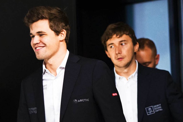 Magnus Carlsen (links) und Herausforderer Sergej Karjakin  | Foto: AFP