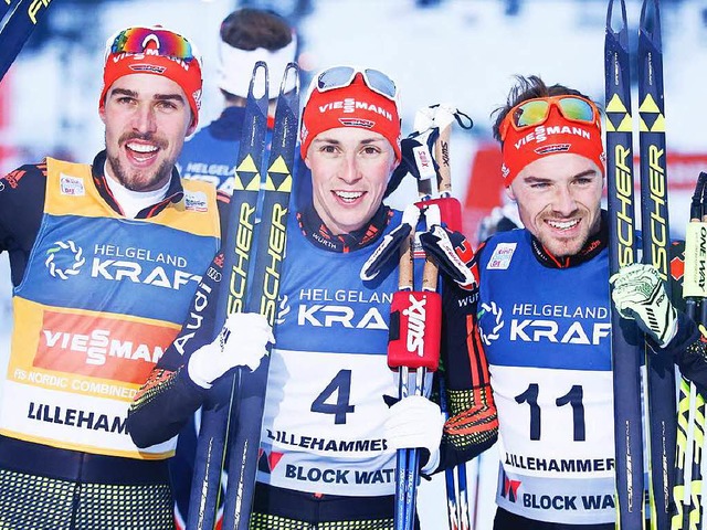 Das deutsche Erfolgstrio (von links): ...dzek,  Eric Frenzel und Fabian Riessle  | Foto: AFP