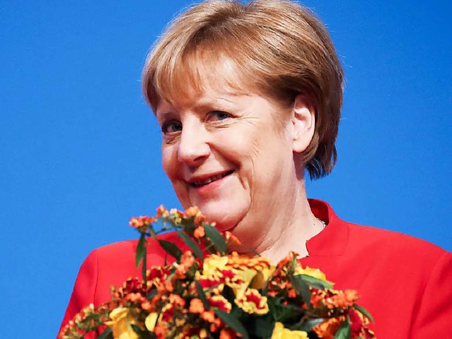 Bundeskanzlerin Angela Merkel ist nur ...als CDU-Parteichefin besttigt worden.  | Foto: dpa