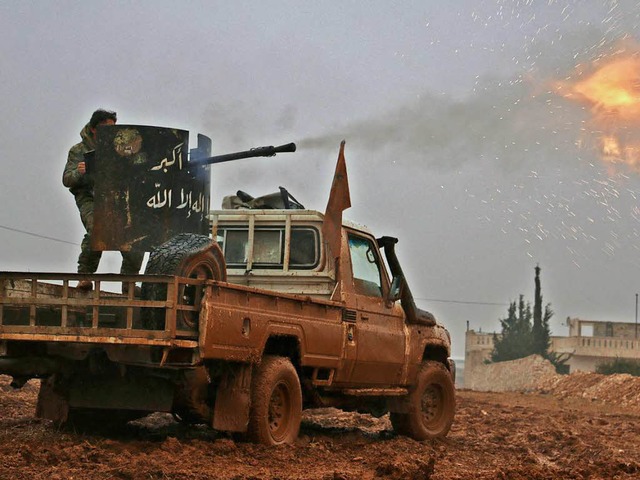 Die Rebellen in Ost-Aleppo haben sich ...en Abzug und eine Feuerpause geeinigt.  | Foto: AFP