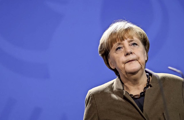 Angela Merkel kndigt Konsequenzen aus...akt vom Berliner Breitscheidplatz an.   | Foto: dpa