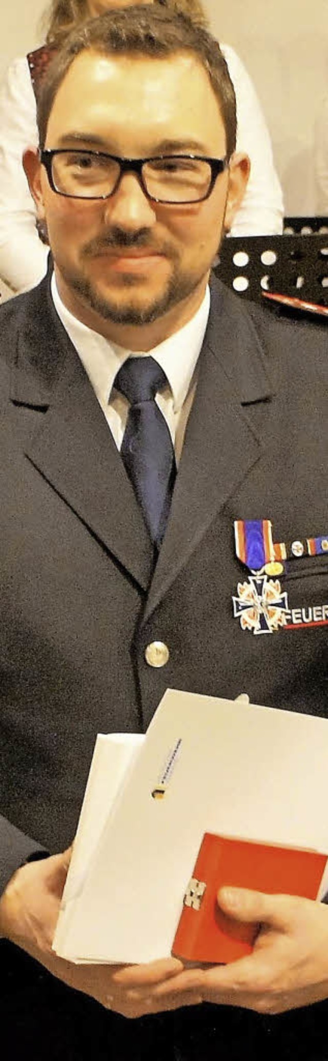 Das Ehrenkreuz in Silber bekam Markus ... Deutschen Feuerwehrverband verliehen.  | Foto: Reinhard Herbrig 