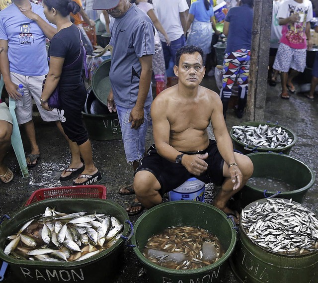 Auf einem Fischmarkt von Manila  auf den Philippinen  | Foto: Francis R. Malasig