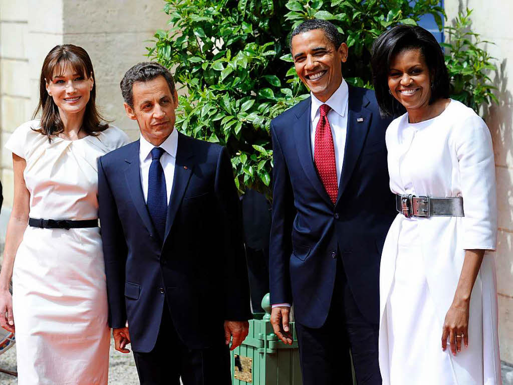 Die franzsische First Lady Carla Bruni-Sarkozy, der franzsische Prsident Nocolas Sarkozy, US-Prsident Barack Obama und US-First Lady Michelle Obama am 6. Juni 2009.