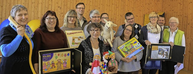 Die Leitungsteams der acht Kindergrte...lhoff und Arno Schweizer (von rechts).  | Foto: DEcoux-Kone