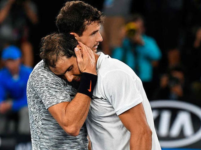 Glck und Pech vereint: Grigor Dimitro...ael Nadal zum Finaleinzug in Melbourne  | Foto: afp