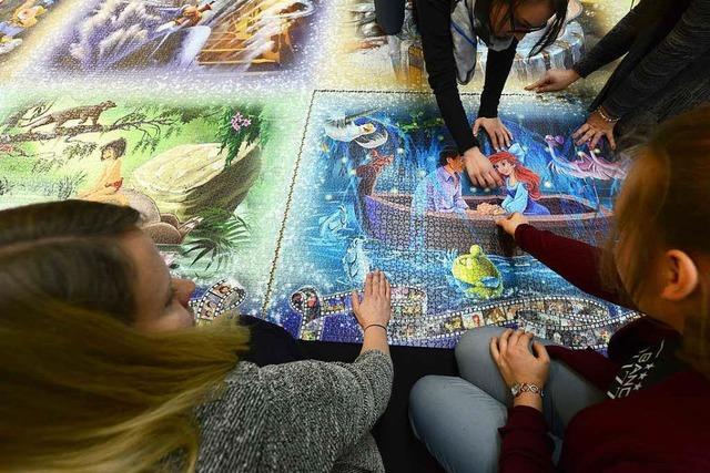 Puzzle-Fans legen in Freiburg das grte Puzzle der Welt zusammen