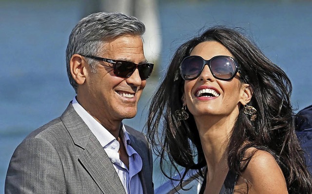 Haben Grund fr gute Laune: George und Amal Clooney   | Foto: dpa