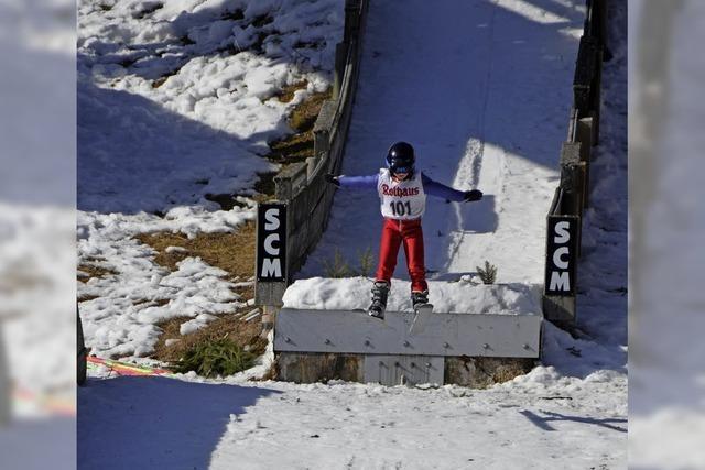 Junge Meister auf Skiern