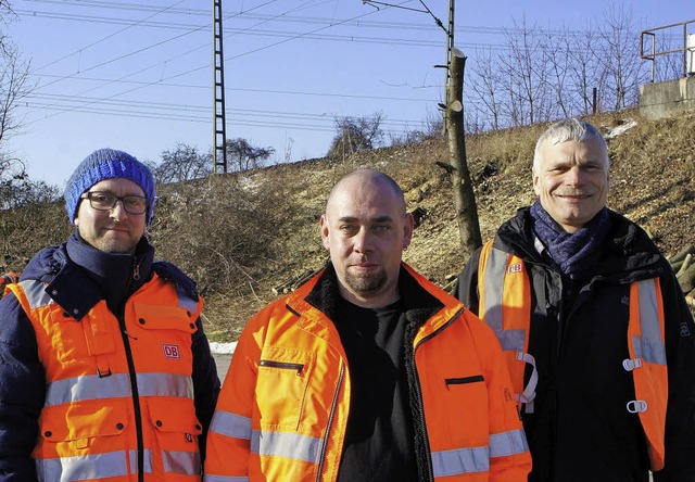 Marc Schroers, Stephan Hiebenthal und ...rbeiten der Bahn am Hang in Norsingen.  | Foto: Savera kang