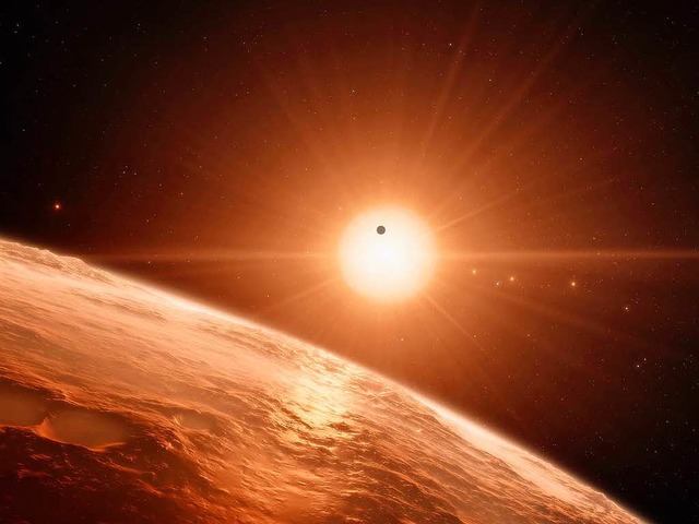Der von der European Southern Observat...nes der Planeten im TRAPPIST-1-System.  | Foto: AFP