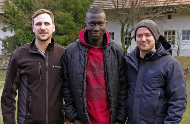 Stolz auf gelungene Integration: Marku...g Badiane und Simon Geiger (von links)  | Foto: Martin Pfefferle